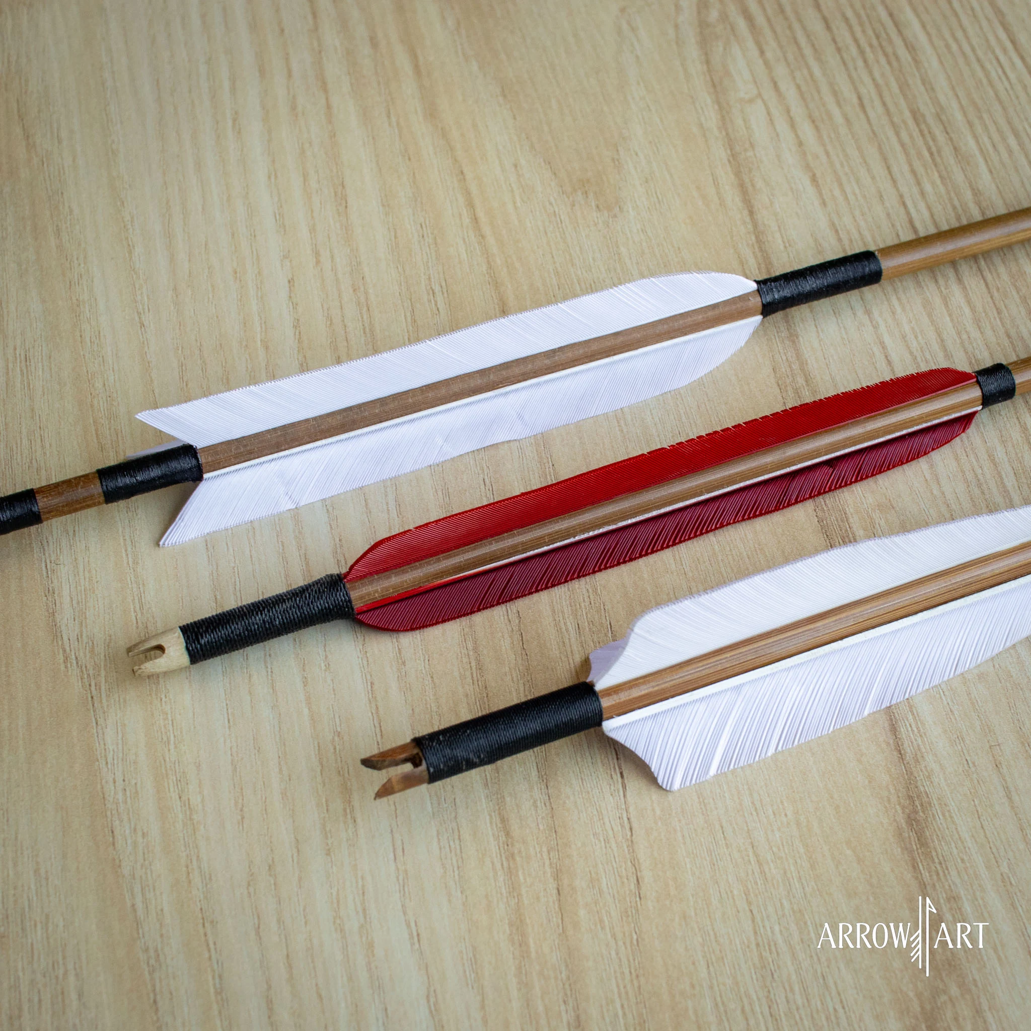 bamboo arrow with natural feathers